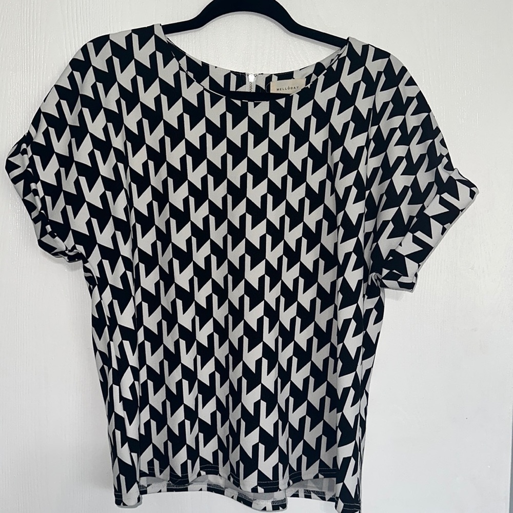 Black and white patterned blouse